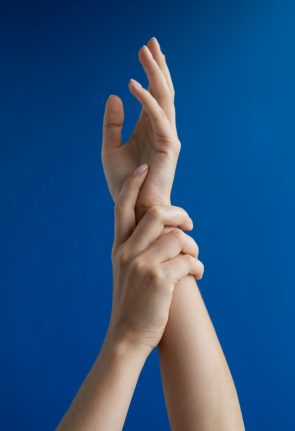 human-hands-against-clear-background